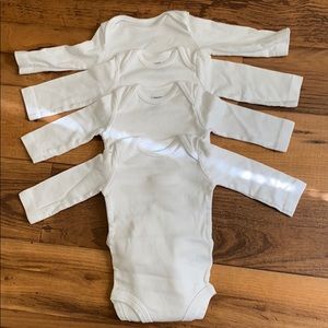 Carter’s long sleeve white onesies size 3 months